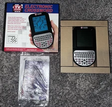 NEW! Excalibur Electronic Crossword Puzzle Game TV Guide 2004 Handheld Game