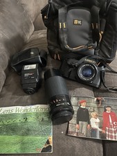 Canon T50 with extra flash long lens strap ba...