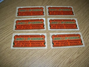 SIX 1930'S JAMES C.McCORMACK COIN OPERATED PHONOGRAPHS & PEANUT MACHINES DECALS