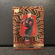 2023-24 Upper Deck Extended Series - Seeing Red Brady Tkachuk #SR-8