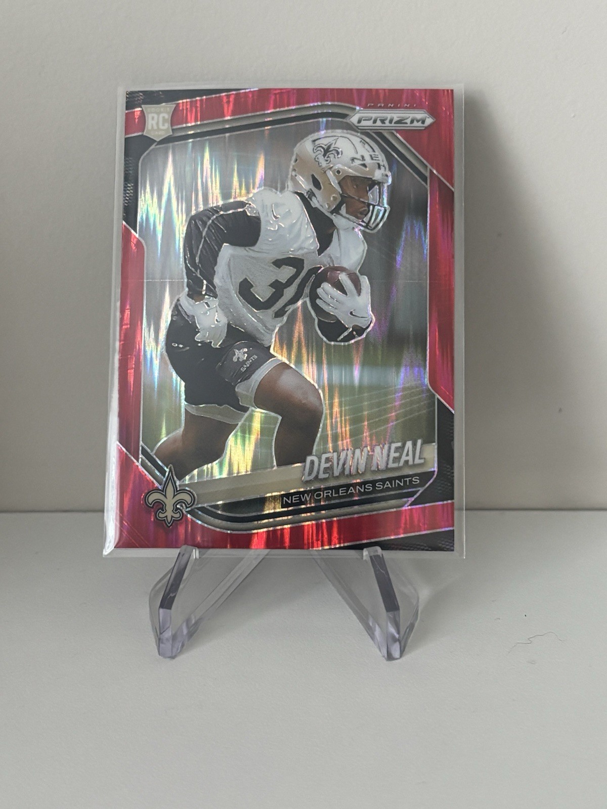 2025 Panini Prizm - Rookies Devin Neal #393 Red Flash (RC)