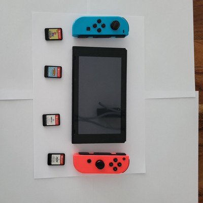 Nintendo Switch mit 4 Spielen + 256GB + Tasche + extra Joy-Cons (Stickdrift)