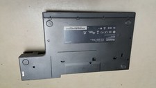 lenovo ThinkPad docking station with charger.