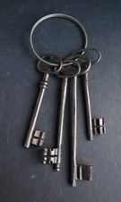 A SET OF FOUR LARGE 18TH CENTUR HAND FORGED CHURCH/ESTATE KEYS