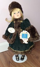 Leonardo Collector's "Tina" Winter Porcelain Doll + Stand - Very Good Condition