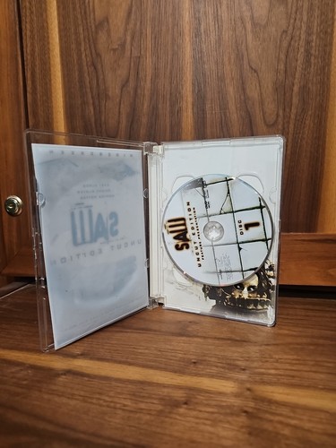 Saw (DVD, 2004) Widescreen Uncut Edition Liquid Sawblade Cover GOOD CONDITION! - Picture 2 of 4