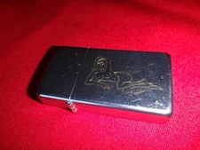 Year 2005 Polished Chrome Zippo Slim Lighter NUDE LADY Logo