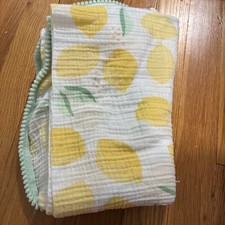 Cloud Island Lemon & Leaf Babydecke mit mintgrüner Bommelborte 50x48 cm