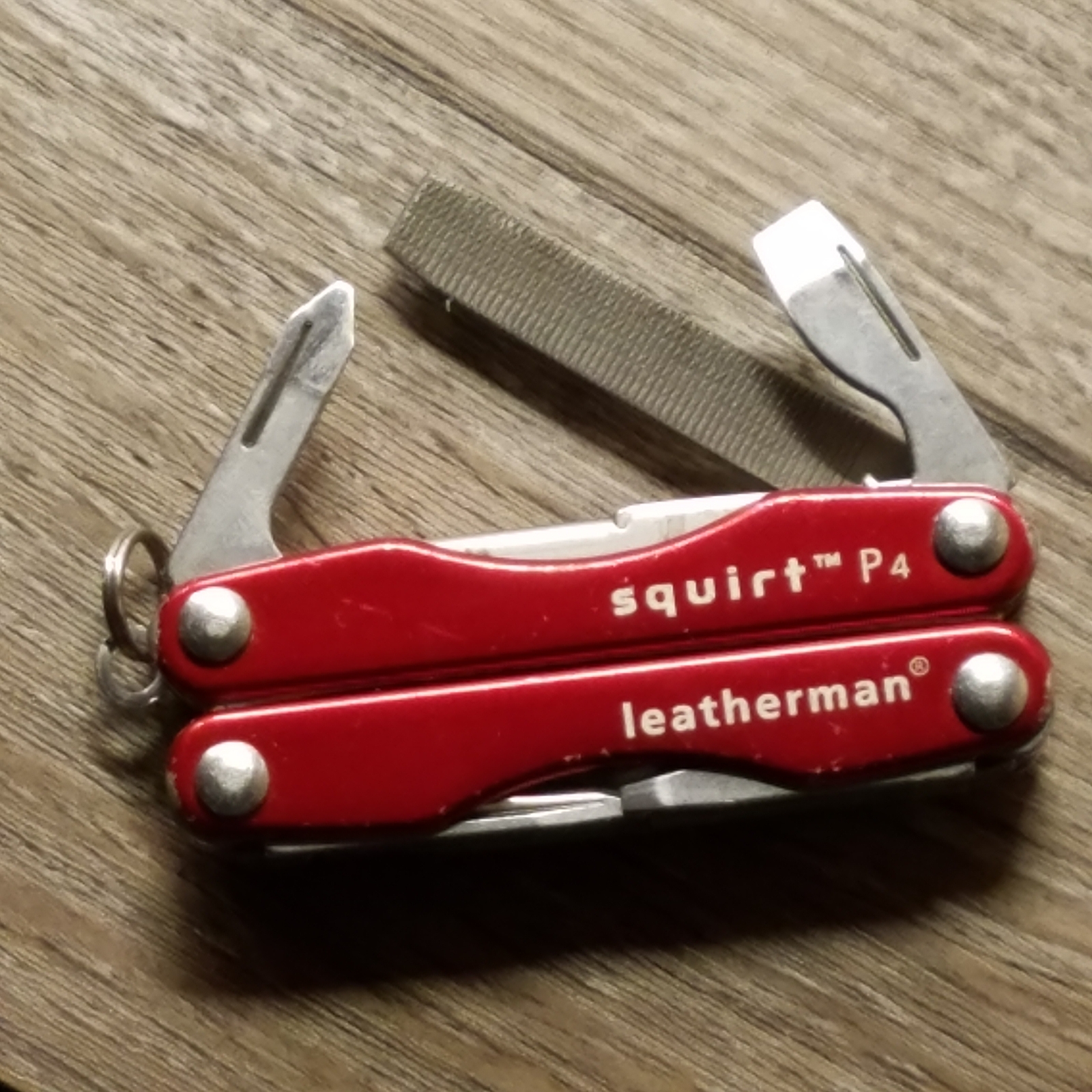 LEATHERMAN SQUIRT P4 MINI MULTI PLIERS TOOL W/ KNIFE RED eBay