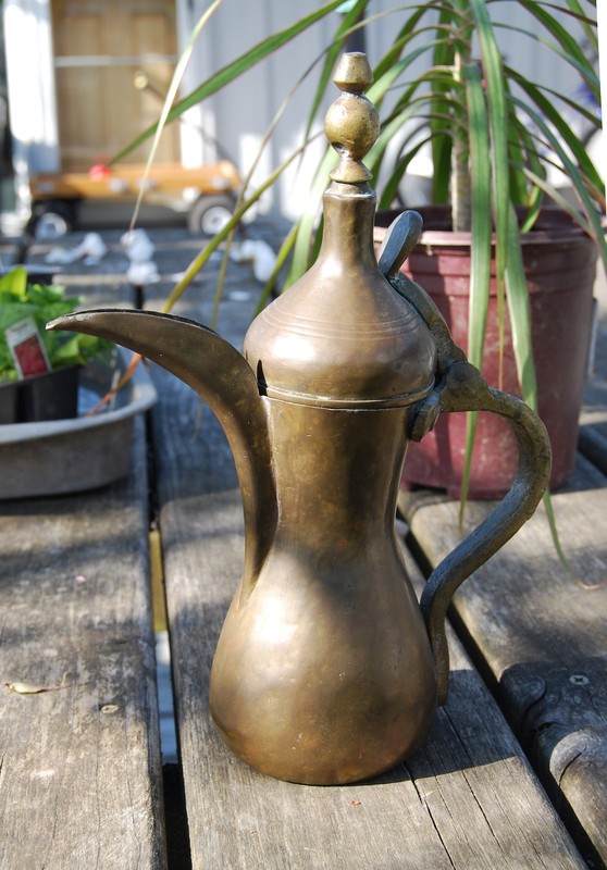 Genuine antique brass Bedouin coffee pot used by nomadic Arabian goat herders