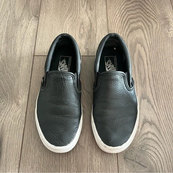 Black slip on top vans size 7