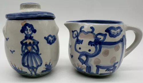 M A Hadley Pottery Cream & Sugar (chipped)Set COW & FARM GIRL FOLK ART 3.5” 4.5”