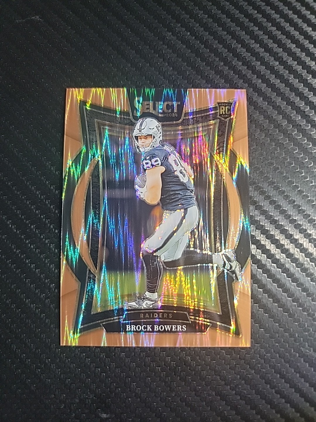 2024 Panini Select - Brock Bowers Concourse #31 Copper Shock Prizm /299 RC