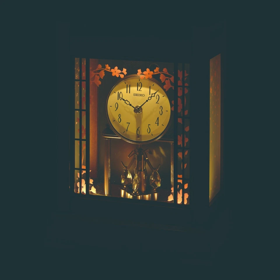 Seiko Wooden Anniversary Quartz Mantel Clock Rotating Pendulum & Light QXN235B - Image 2 of 2