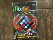 Rubiks Slide Electronic Game 10,000+ Brain Busting Puzzles Rubiks Cube New