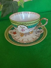 Vintage Footed Tea Cup And Saucer Marked Austria Green / Gold Trim