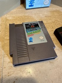RAD RACER &mdash; NES | BOX + CARTRIDGE + DUST SLEEVE | NO MANUAL | TESTED