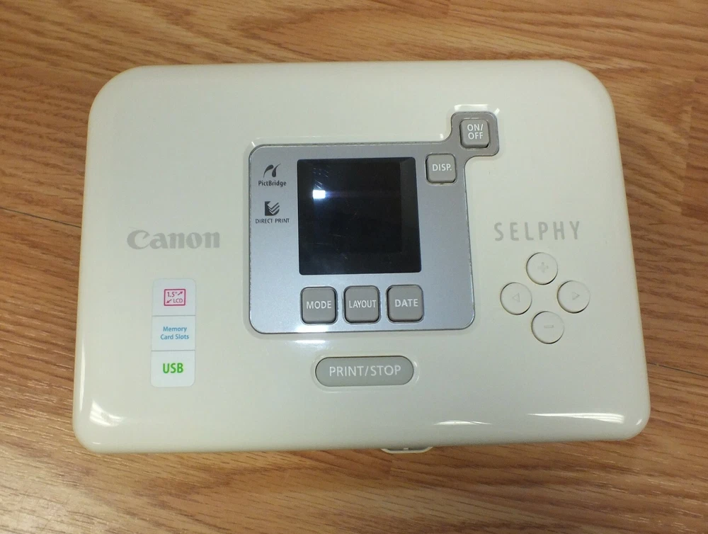 Canon Selphy CP720 Compact Photo Printer with 1.5-inch LCD & Paper Tray