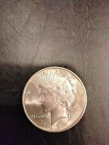 1924 Peace Dollar Silver Uncirculated or 1 grade below