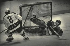 1983 Press Photo Admiral's Darrell Anholt watched his shot go over Flint goalie.