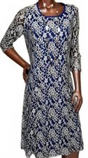BFA Classic Lace Overlay Midi Dress Material has stretch A classic!