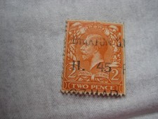 UK King George 2 penny stamp with overprint