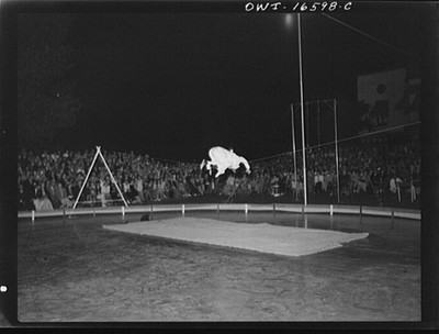 Photo:Pole Vault Competition Night Stadium 1900s Crowd Track Field