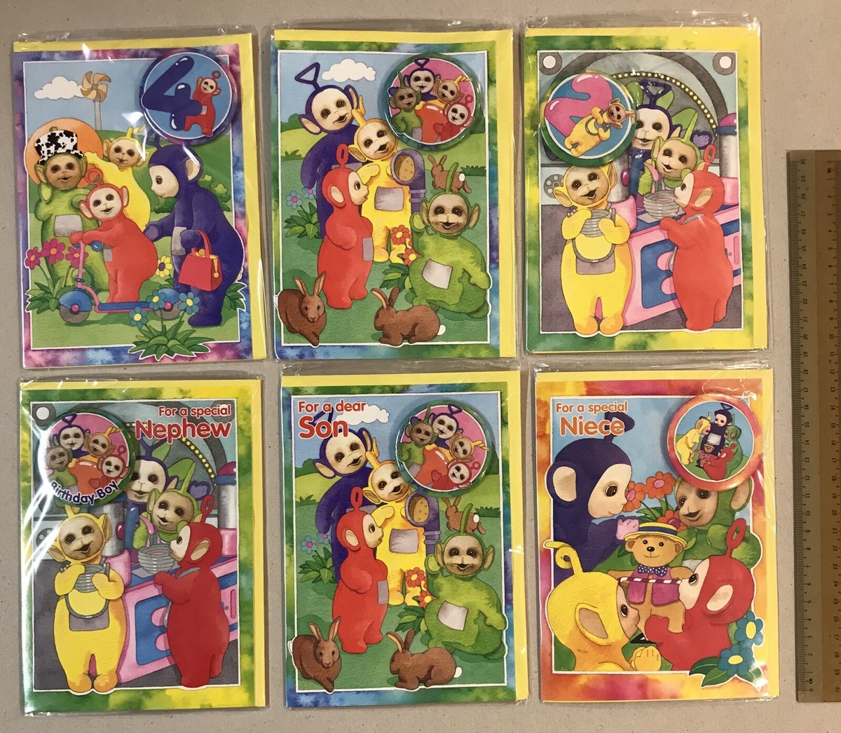 1996 Teletubbies Greeting card x6, Po / Laa Laa Lapel Pin x8, and