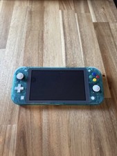 Nintendo switch lite with a light blue/ green transparent shell swap at eBay