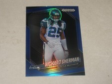 2025 Panini Prizm Black Blue Prizm #136 Richard Sherman 096/199