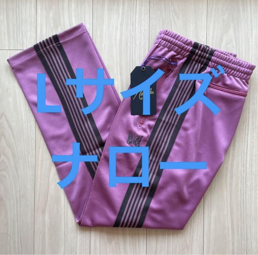 Pink tapered track pants with narrow needle stripe detail  