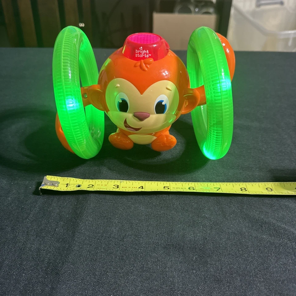 Juguete para bebé gateando mono con luces y sonidos Bright Starts Roll & Glow Foto 2 de 4