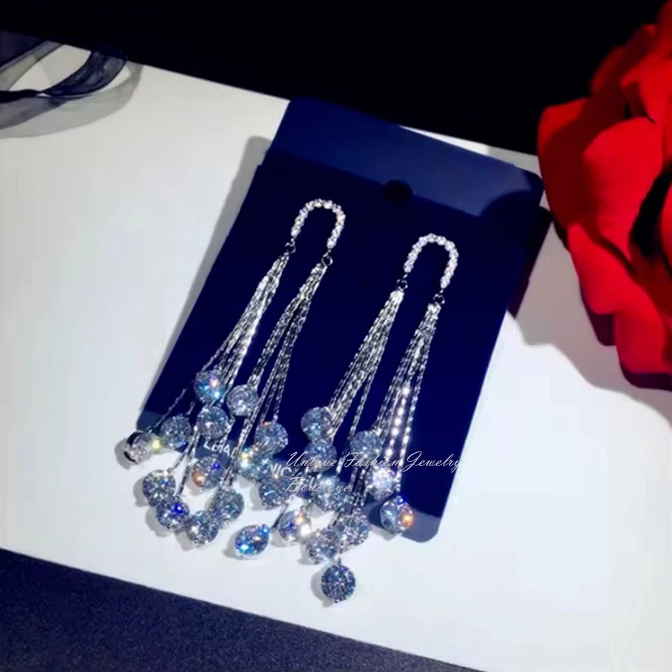 Pendientes araña largos de borla enchapados en oro blanco de 18k hechos con diamante Swarovski Foto 3 de 4