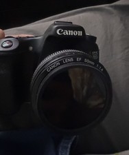 Canon EOS 70D Camera Bundle with EF 50mm f/1.4  EF 75-300mm Lenses, 2 Batteries