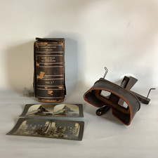 Antique Keystone View Company Stereoscope viewer and World War Vol. I slides