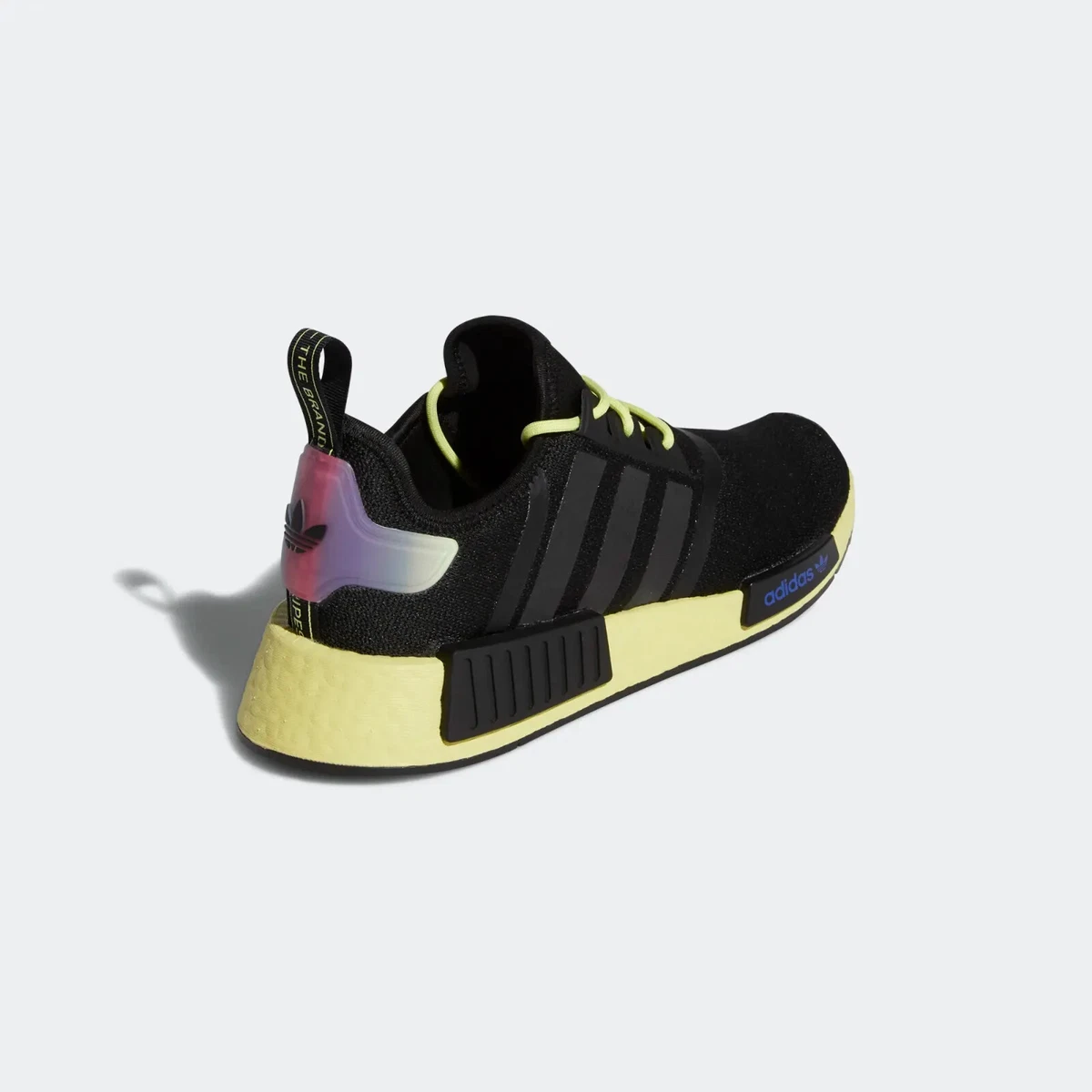 Yellow and store black nmds