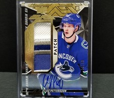 2018-19 ELIAS PETTERSSON UD BLACK Rookie Trademarks Patch Auto RPA /40 Card. rookie card picture