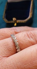 Platinum 9 diamond, cross-over bezel set, eternity / wedding ring, 0.30 carat