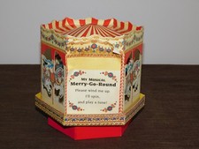 VINTAGE TOY 6 1/2" CARDBOARD WIND UP MY MUSICAL MERRY GO ROUND PLAYS MUSIC 