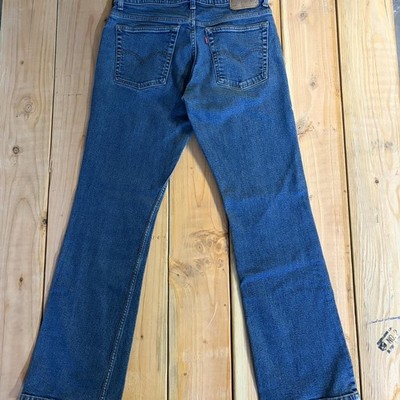 Vintage 90 s paper tag Levi's 515 blue bootcut jeans