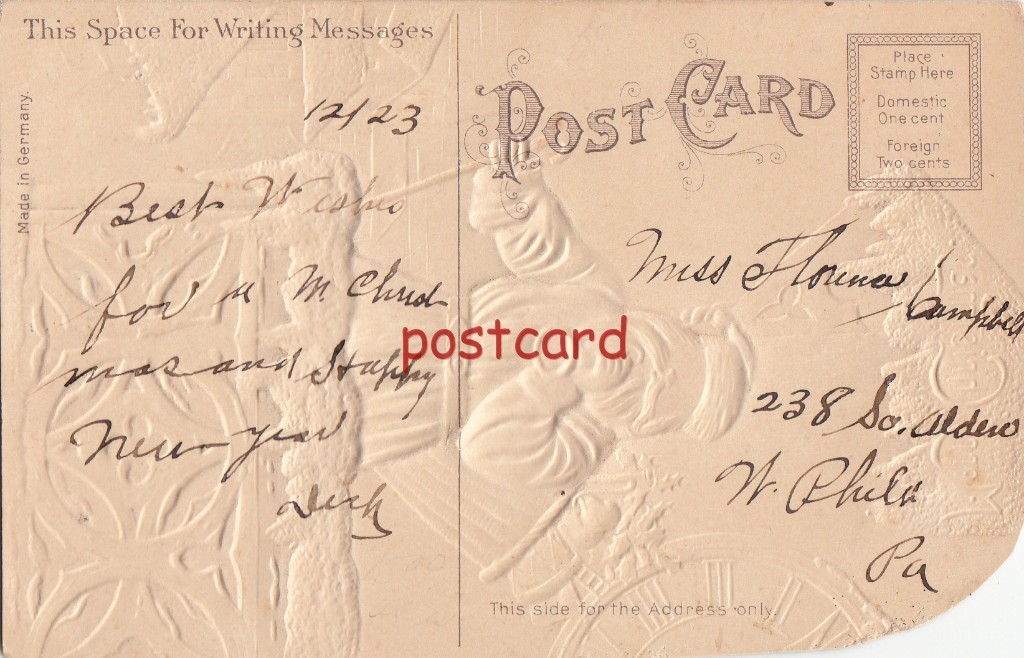 MERRY CHRISTMAS Santa blowing horn with basket of gifts, embossed