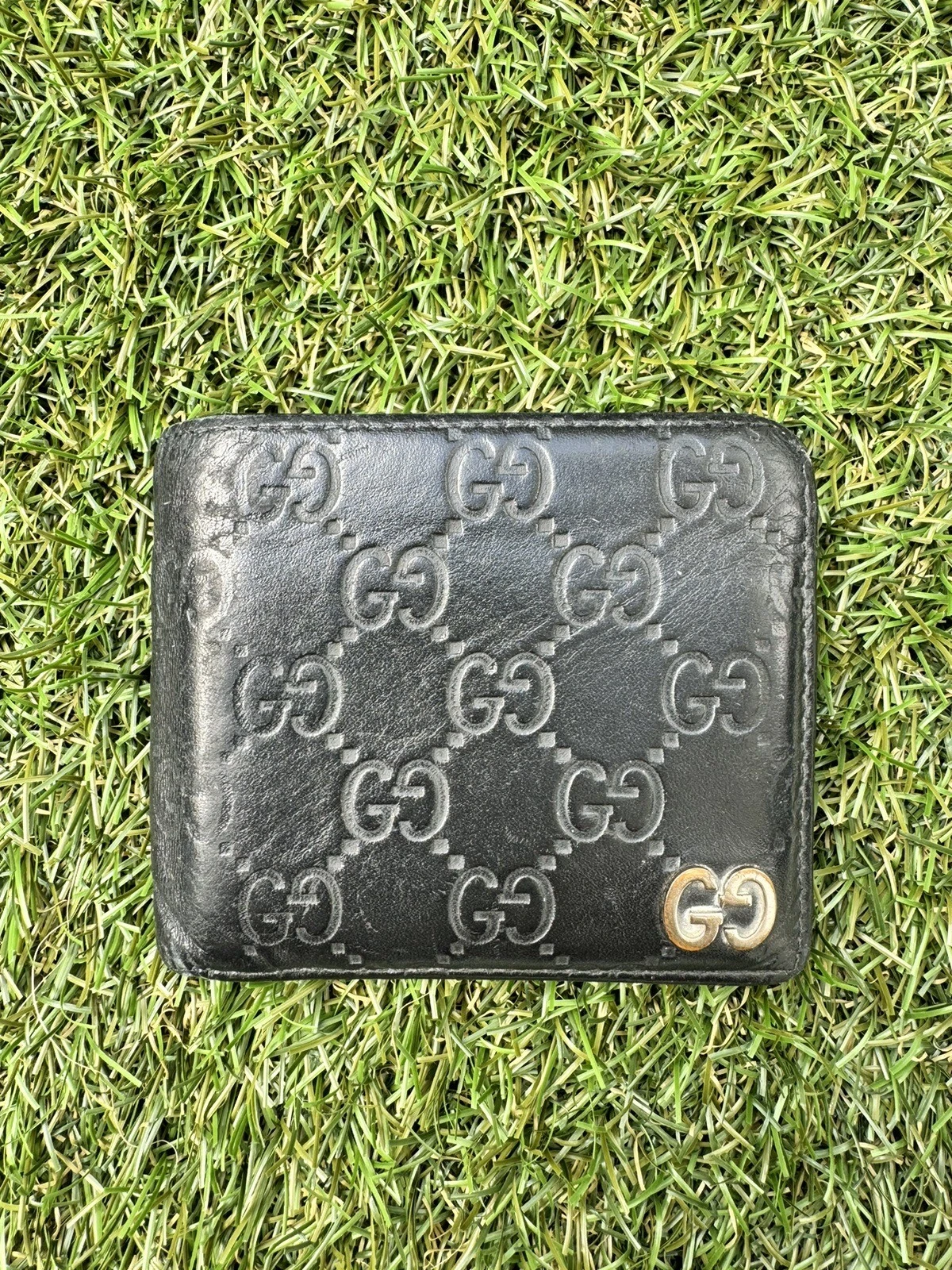 Portefeuille en cuir noir pliant pliant Gucci GG Supreme Logo Signature