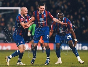 Crystal Palace multi-signed by Shaun Derry, Darren Ambrose, and Claude Davis. 