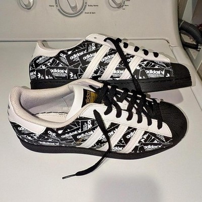 Adidas superstars black and white