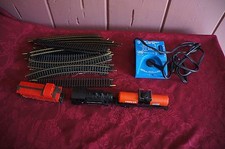 MIXED LOT: TOY TRAINS, TRACKS AND TRANSFORMER