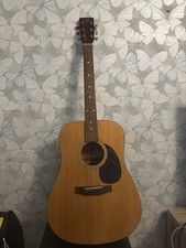Tanglewood TW-400SM acoustic guitar, a model crafted in Korea.