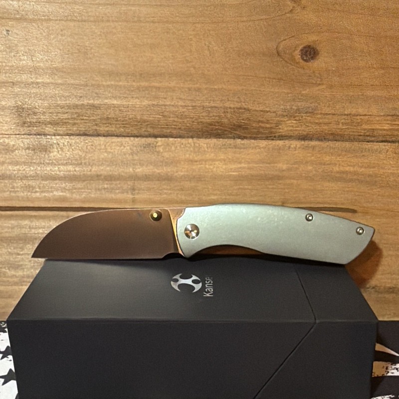 Kansept Convict K1023B3 CPM-S35VN GREEN ANO TITANIUM HANDLE WITH SHEEPDOG DESIGN