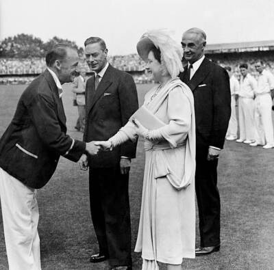 The Queen shakes hands with Don Bradman as the King looks - 1948 Cricket Photo
