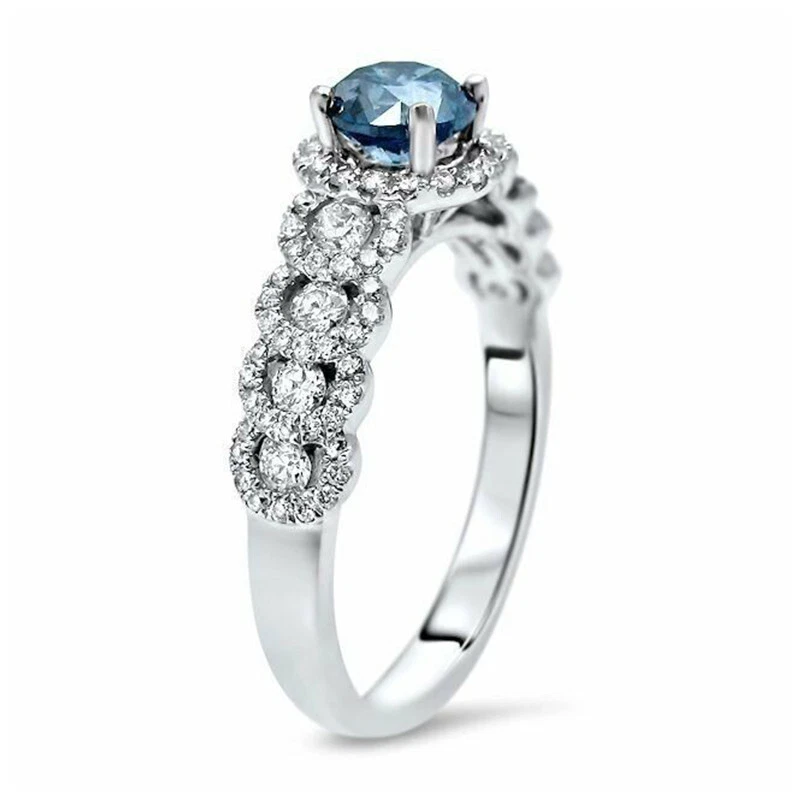 Anillo de compromiso de aniversario con halo de zafiro azul redondo de 2,2 quilates de oro blanco de 14 k Foto 2 de 4