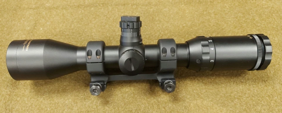 Mira para rifle Konuspro M30 1,5x-6x44 con montaje DNZ Freedom rojo/azul #7285 táctico Foto 2 de 4